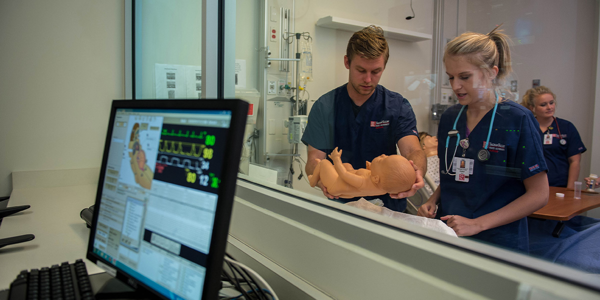 Nursing Students Caring for a fake child